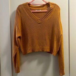 VGUC boxy cropped v-neck sweater in mustard from American Eagle